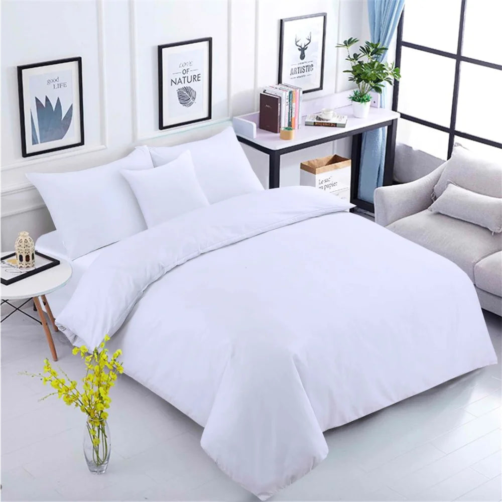 White 100% cotton hotel duvet cover set with matching pillowcases for commercial accommodation.