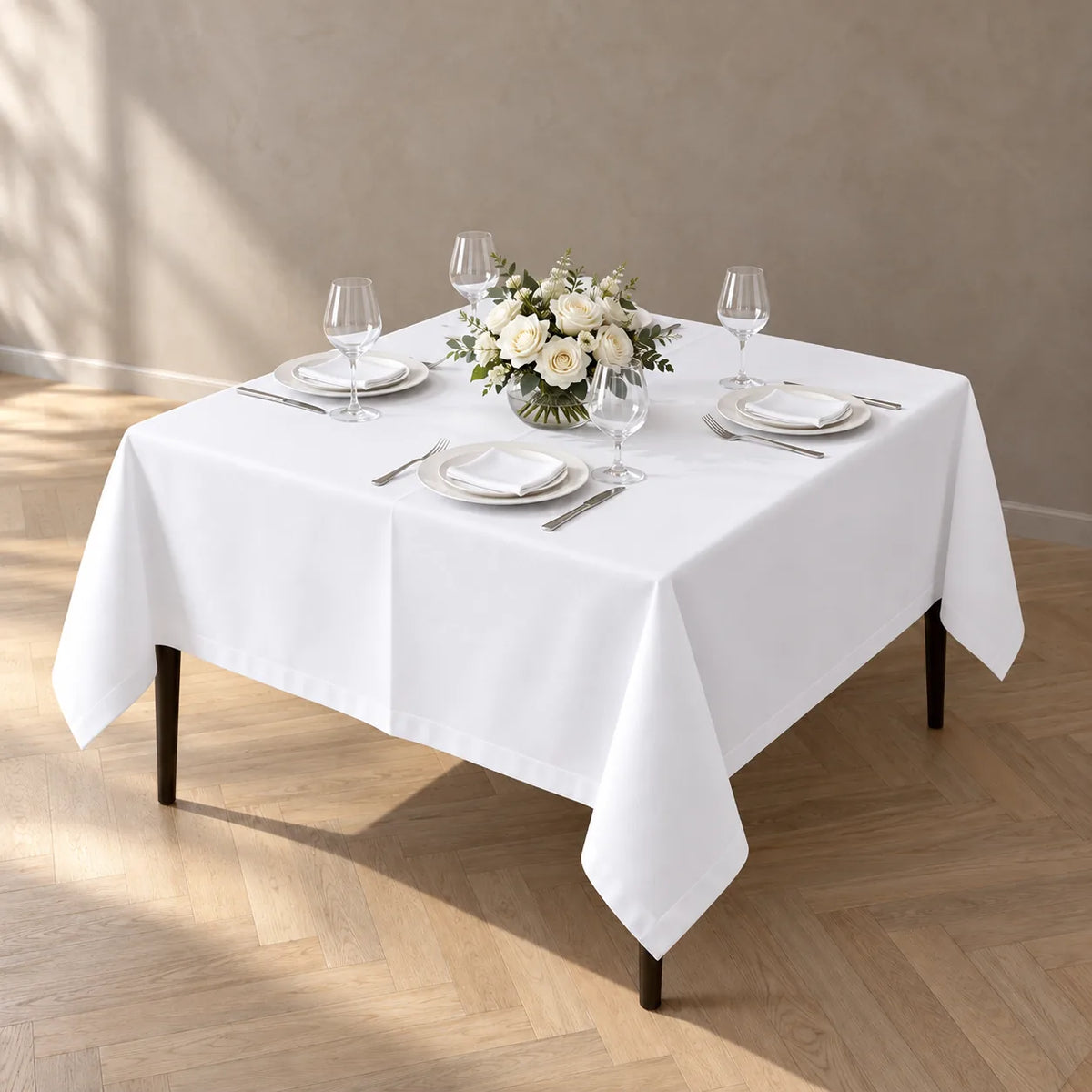 White heavy duty table cloth 140 x 140 cm on a square table for four NZ